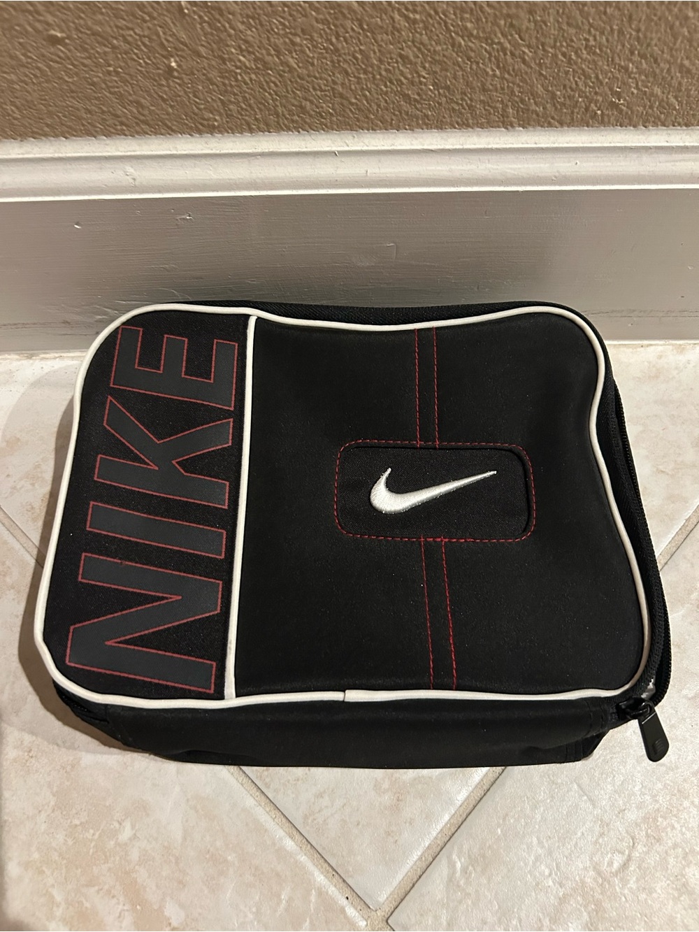 Nike Black Toiletry Pouch with White Swoosh and Red Accents